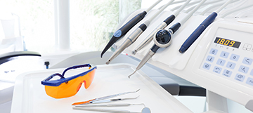 Equipment and dental instruments in dentist’s office. Tools close-up. Dentistry